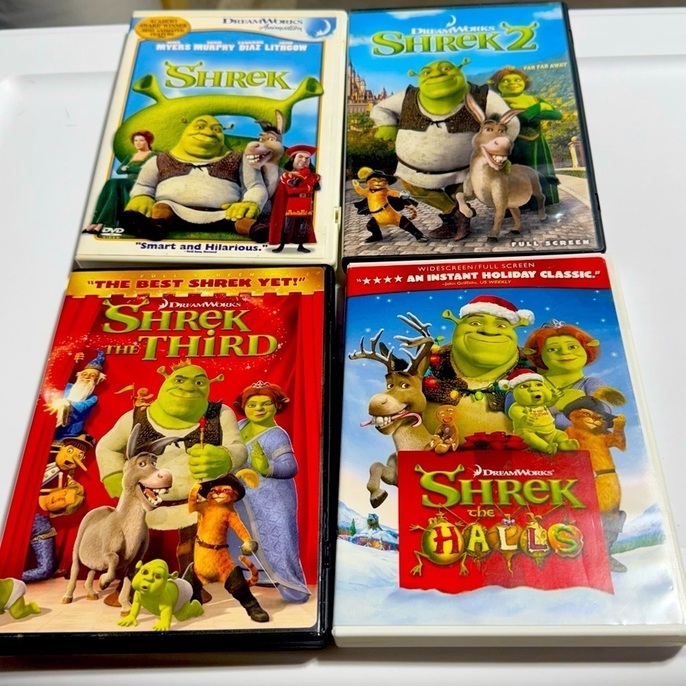 Dreamworks Sherk 4 DVD Bundle. Includes Shrek 1, 2, 3, & Shrek The Halls